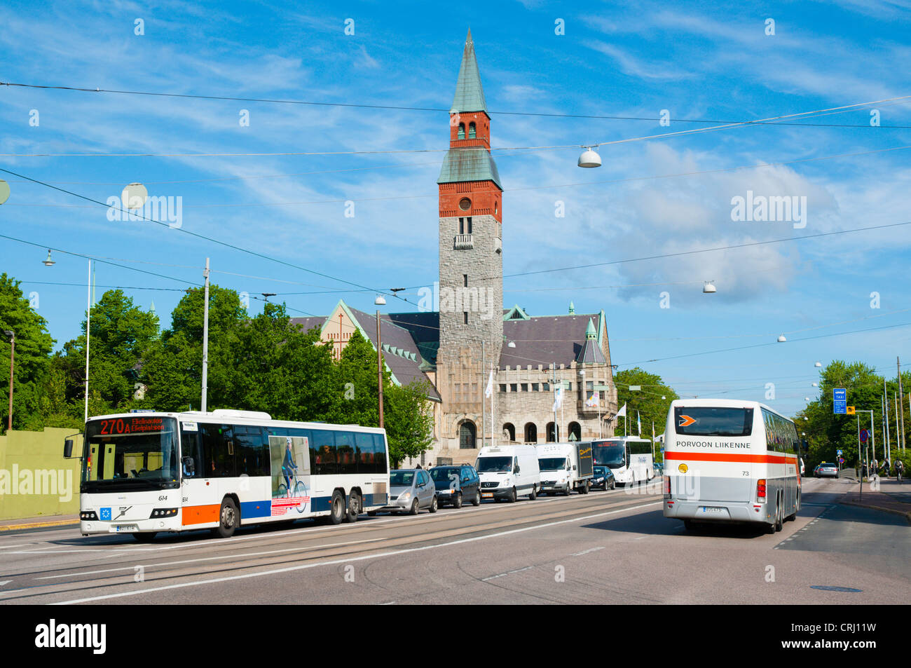 Traffic on Mannerheimintie street in front of Kansallismuseo the National Museum building central Helsinki Finland Europe Stock Photo