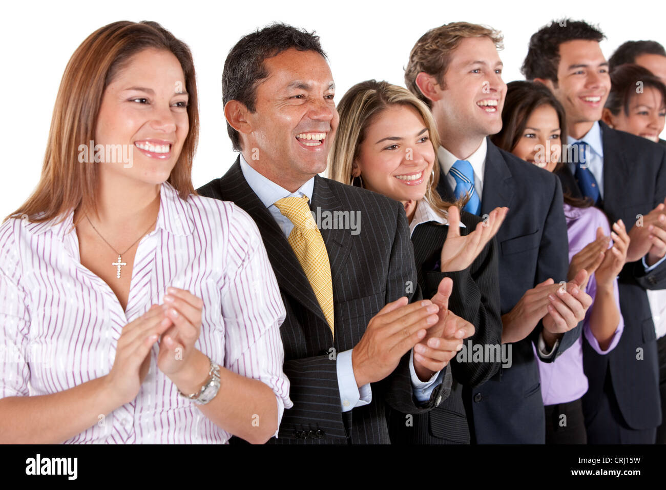 young business people standing in a row smiling and applauding Stock ...