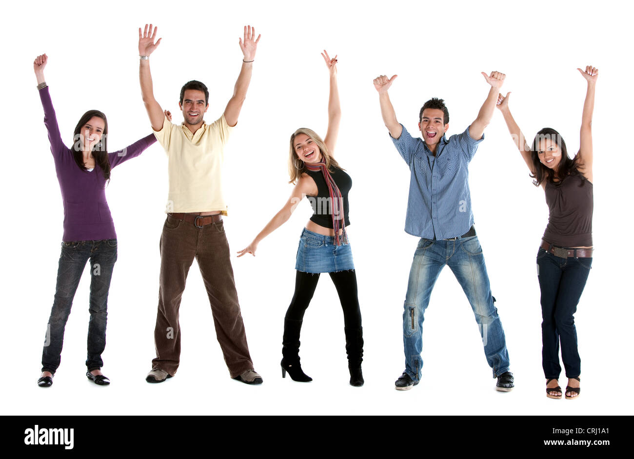 five young people in casual clothing standing side by side cheerfully throwing their arms into the air Stock Photo