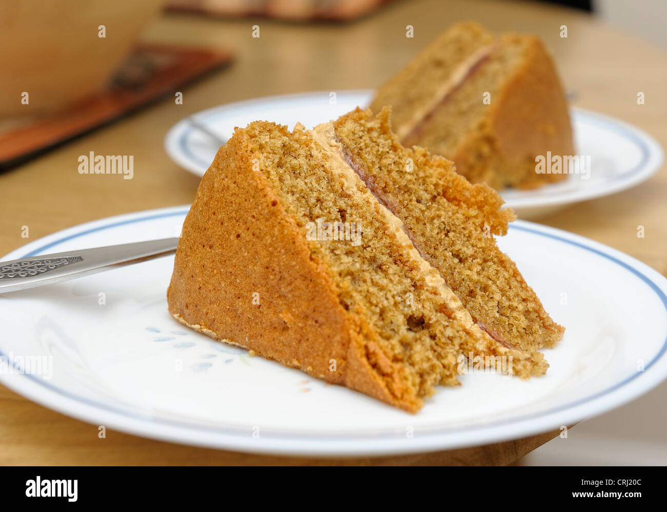 homemade coffee cream sponge cake on a plate Stock Photo