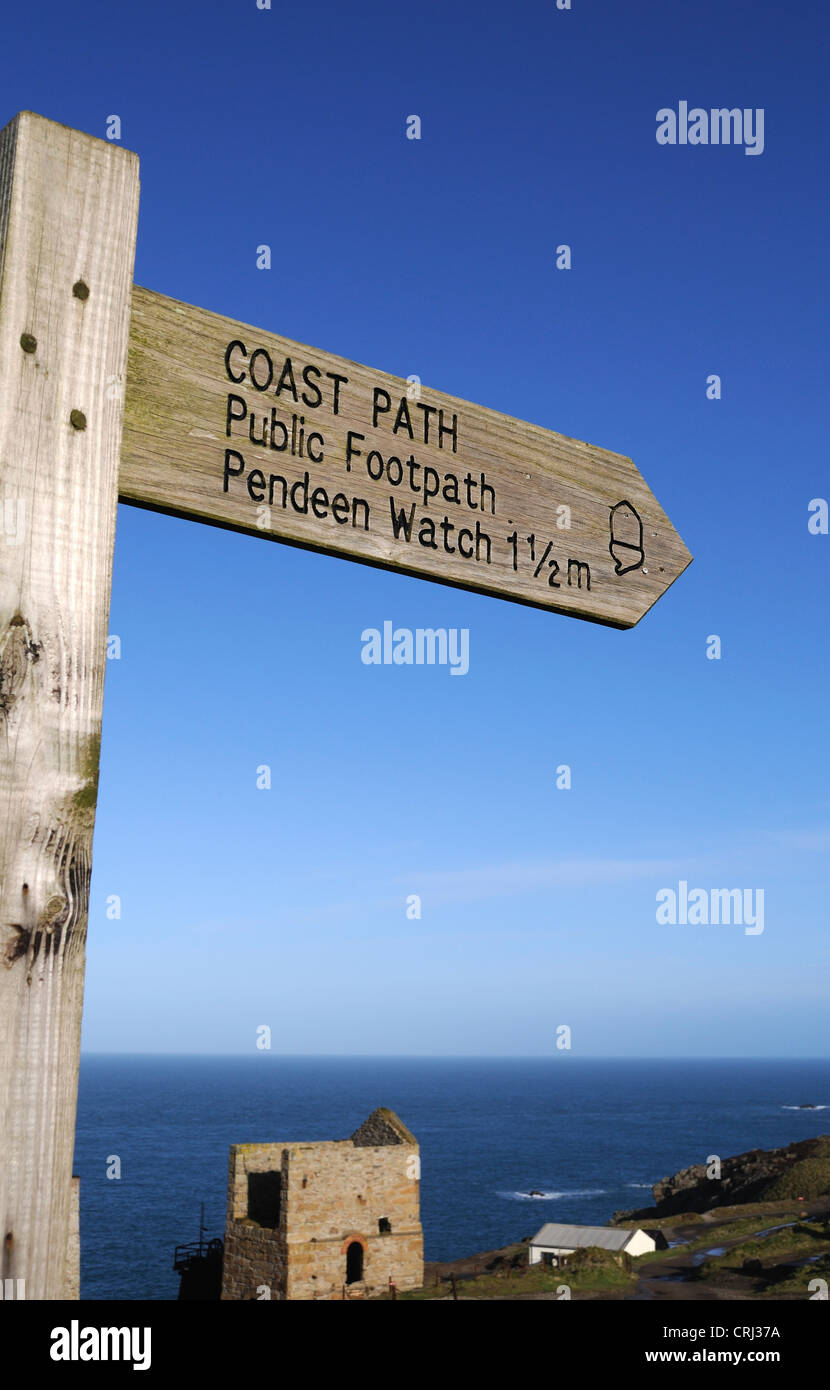 A direction signpost on the south west coast path near Pendeen in Cornwall, UK Stock Photo
