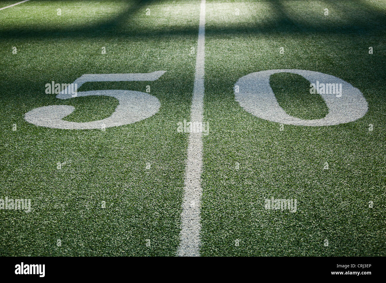 50 yard line marker in American Football stadium. Stock Photo