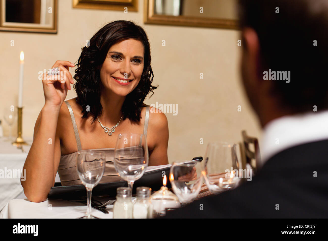 Couple having dinner in restaurant Stock Photo