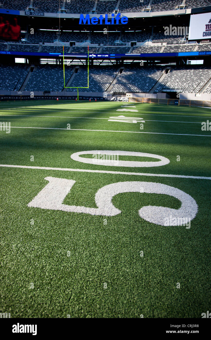 50 yard line marker in American Football stadium. Stock Photo