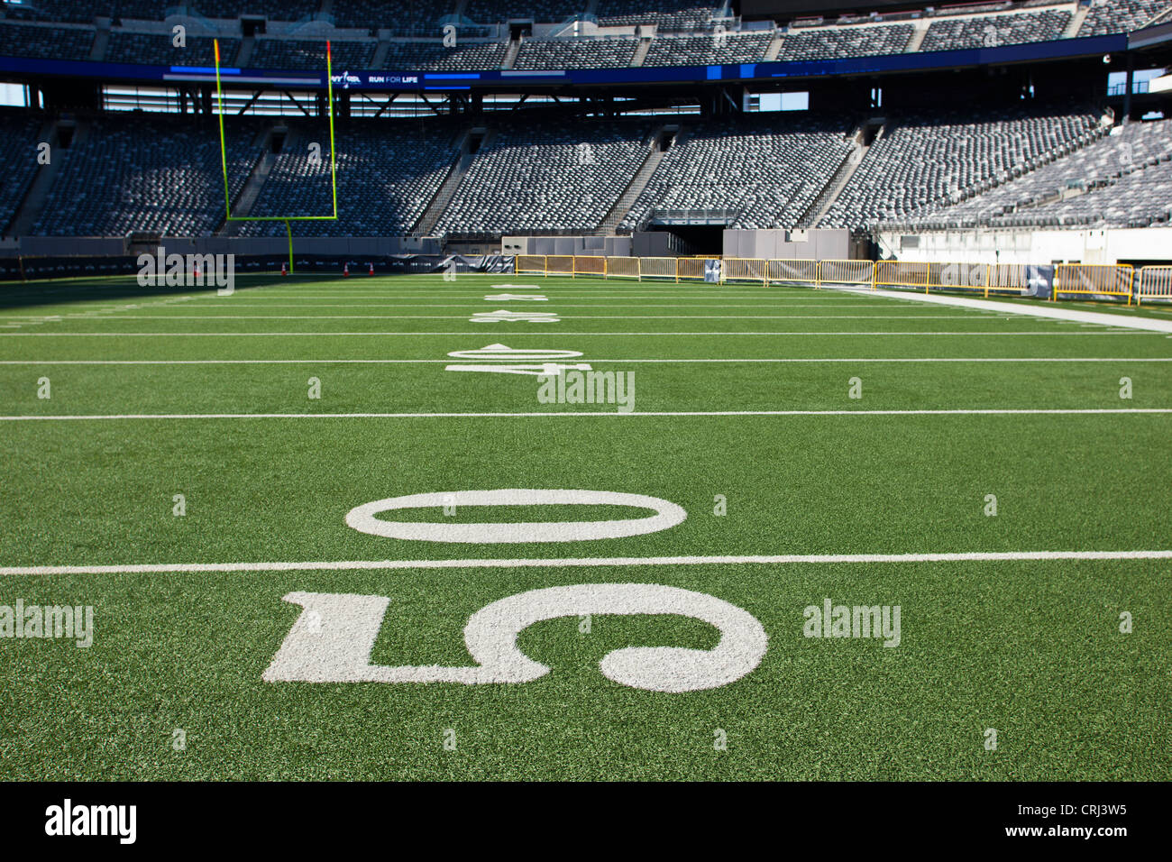 50 yard line marker in American Football stadium. Stock Photo