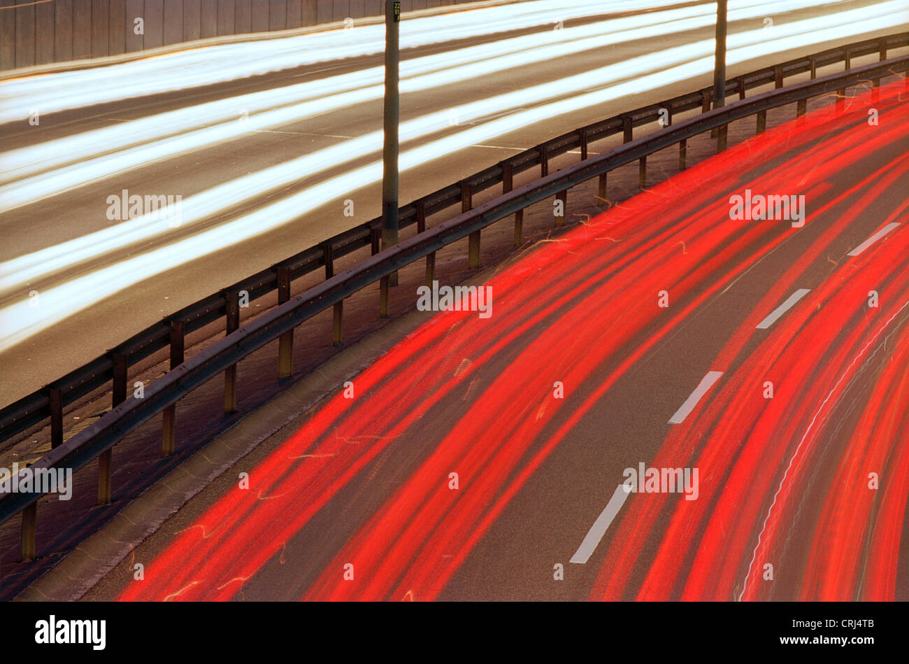 Light trails of vehicles on the freeway at night Stock Photo