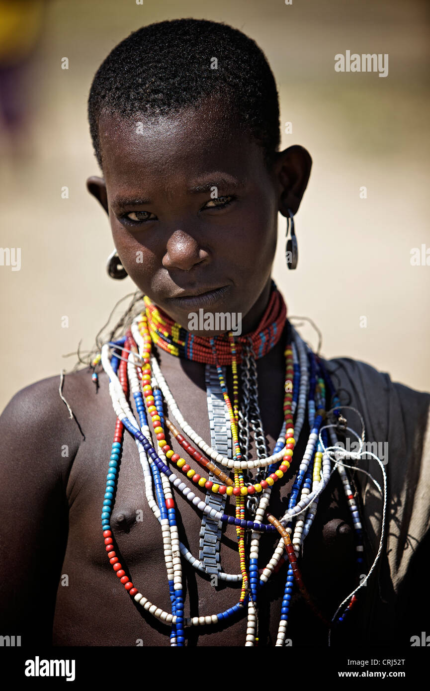 Tribal girl wearing traditional necklaces Stock Photo - Alamy