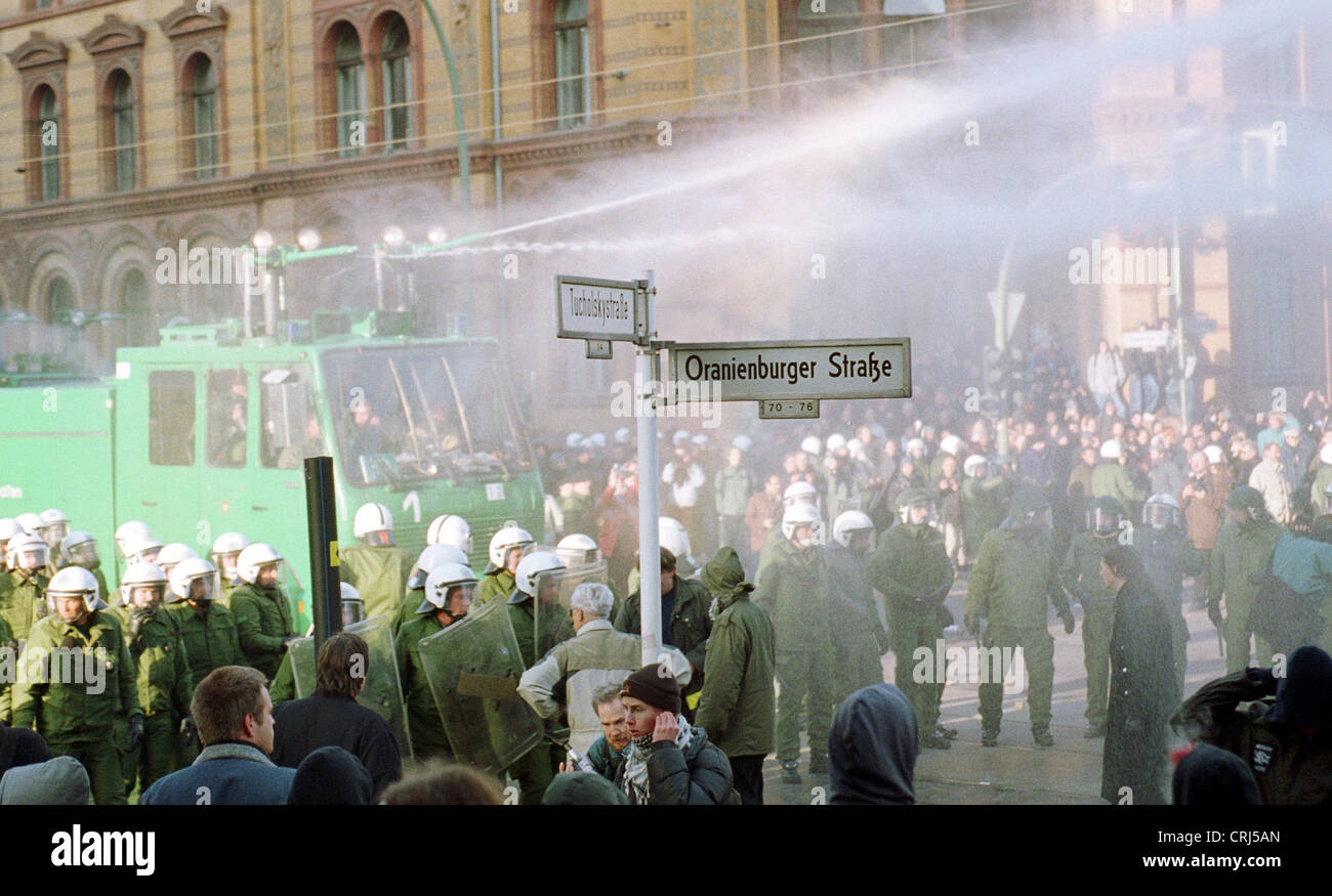 Police and protesters during a demonstration in Berlin Stock Photo