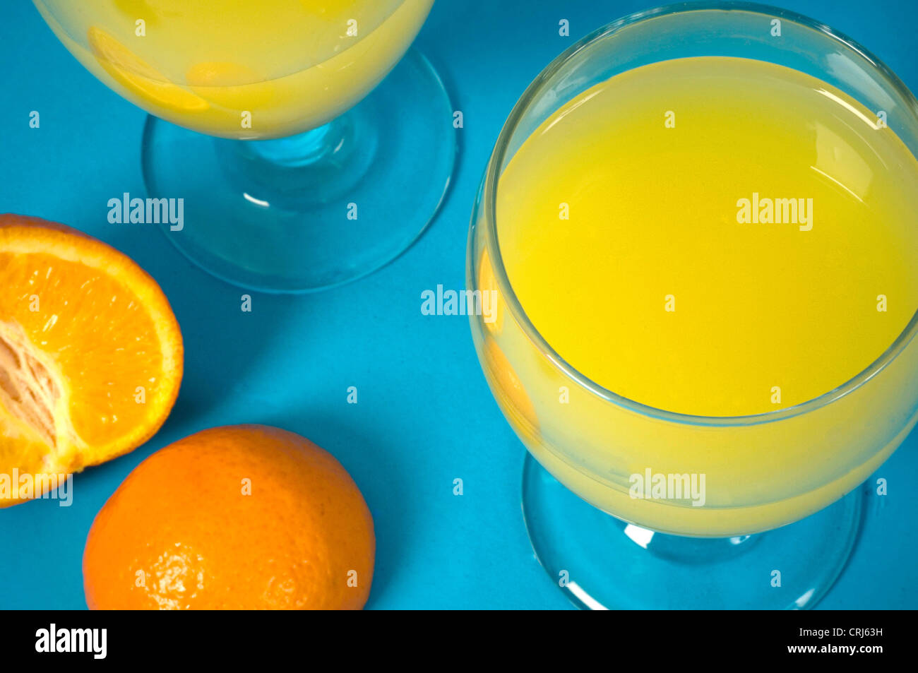 Ascorbic Acid Blue Background Common Cold Drink Folic acid Fruit Glass Glasses Healthy drink Healthy drinking Orange Orange Juic Stock Photo