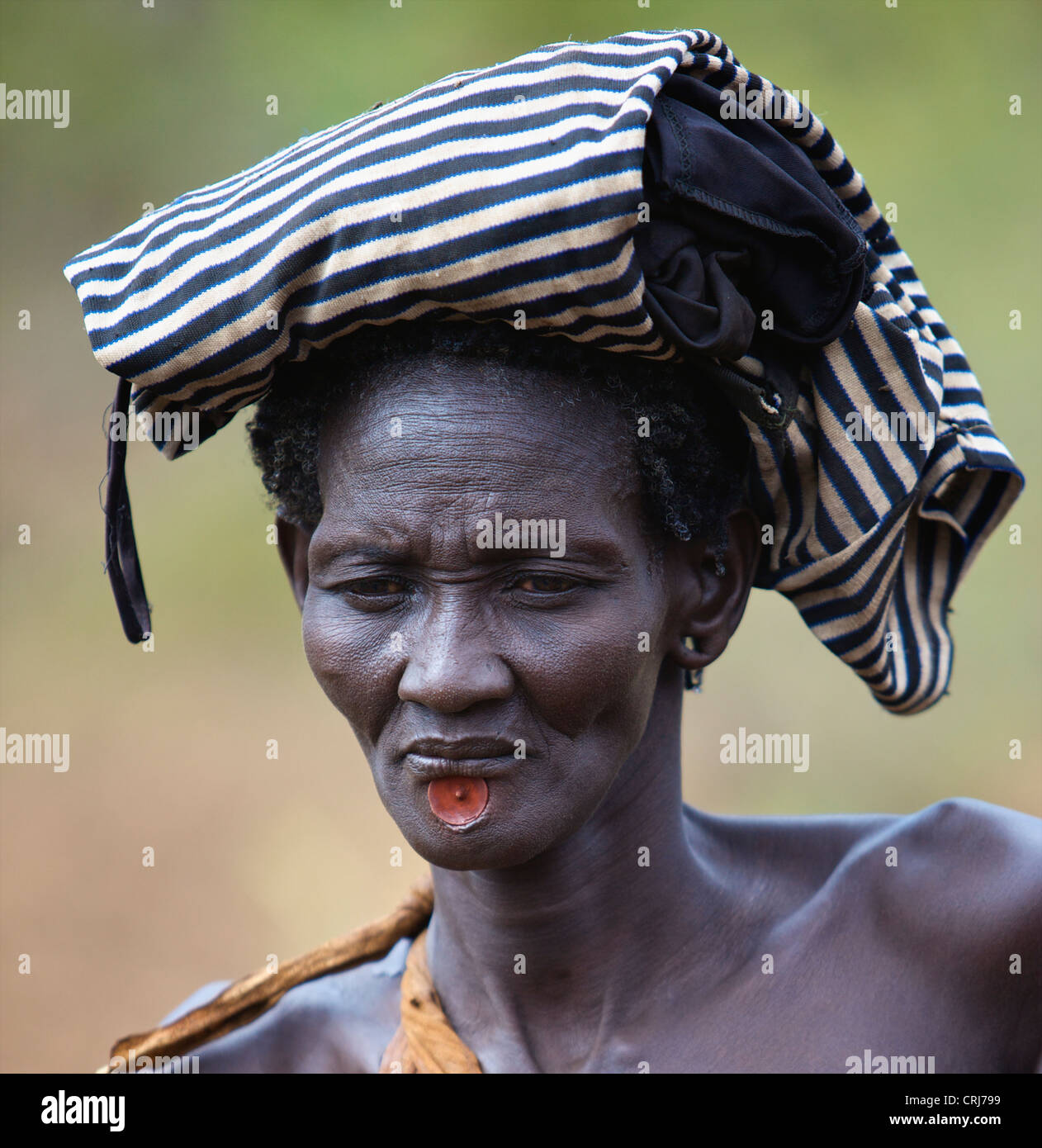 Woman from the Bodi tribe wearing a traditional lip plug. Stock Photo