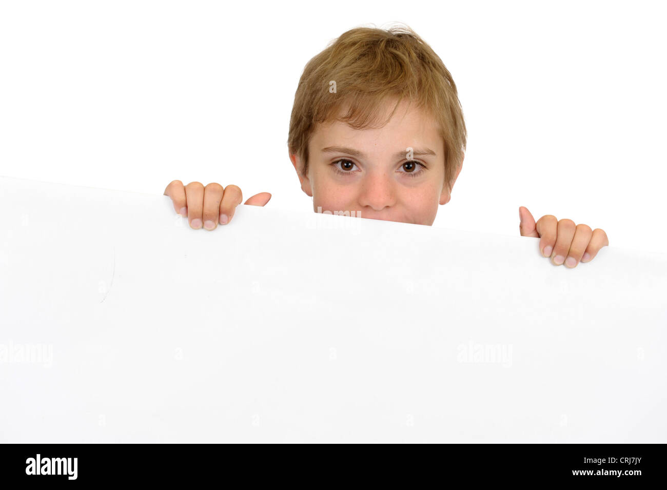 boy holding a white cardboard Stock Photo