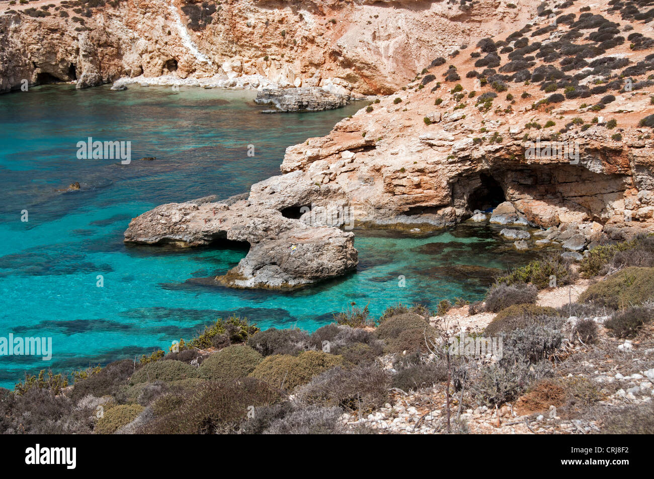 Rocks on Malta island with blue sea Stock Photo - Alamy