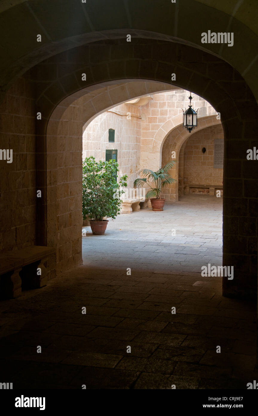 insite view trought bows from stones on Malta Stock Photo