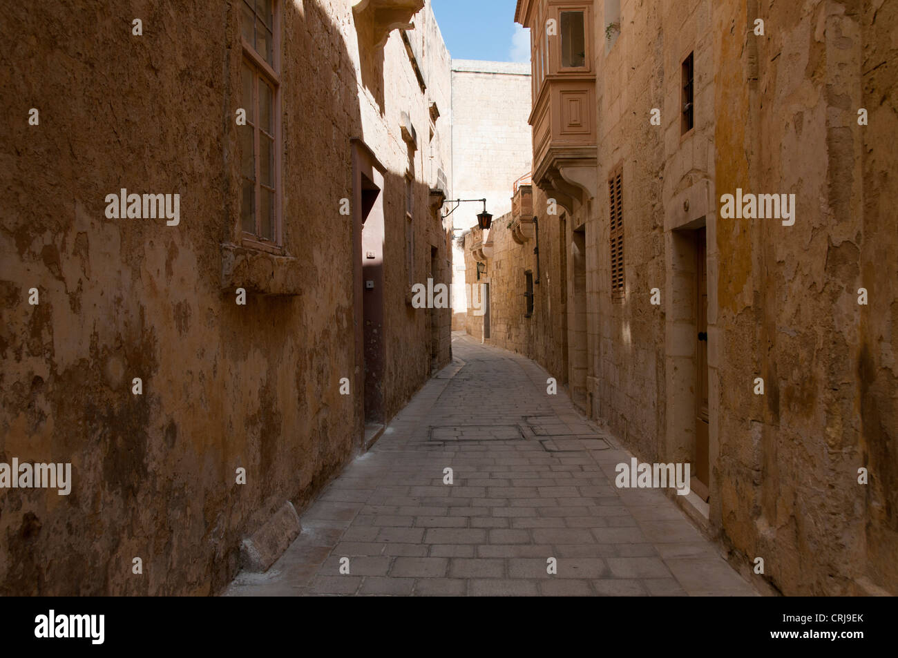 street and houses from stone in the old city of Malta, Valetta Stock Photo