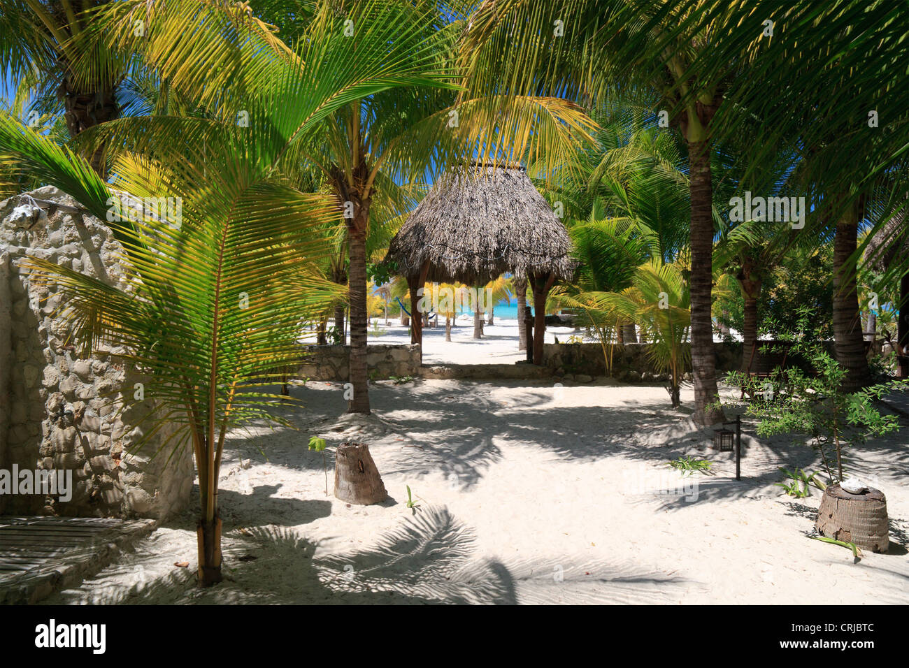 Palapa beach entrance on the grounds of a small hotel in Isla Holbox, state of Quintana Roo, Mexico Stock Photo