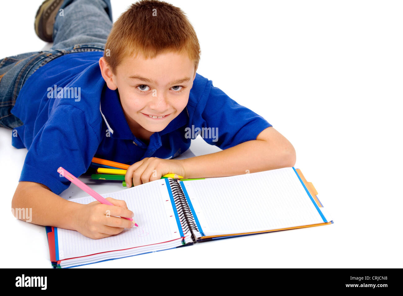 boy studying on the floor Stock Photo Alamy