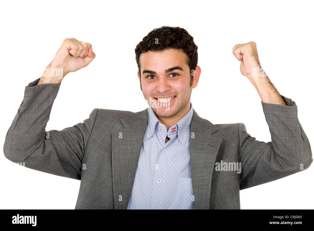 successful business man with arms up looking happy Stock Photo - Alamy