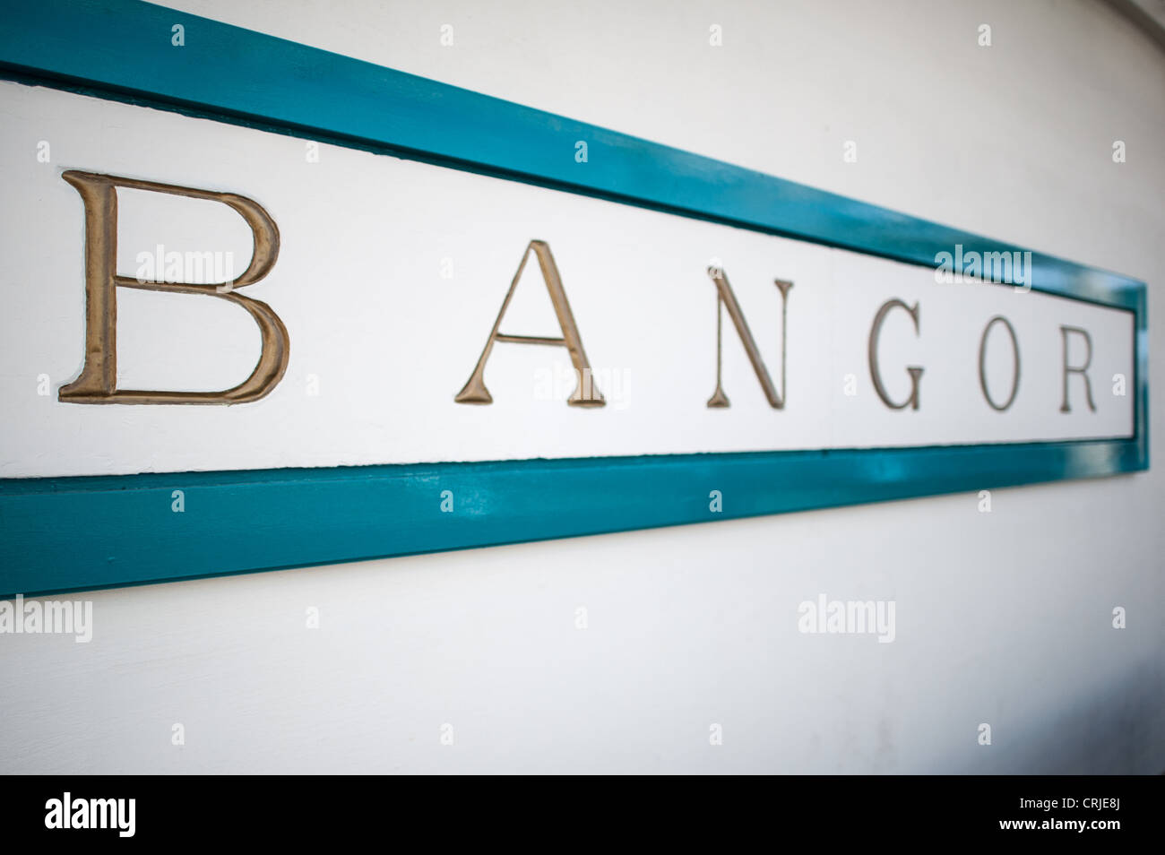 BANGOR, Wales - Place name sign at Bangor Railway Station in northwest Wales, UK. Stock Photo