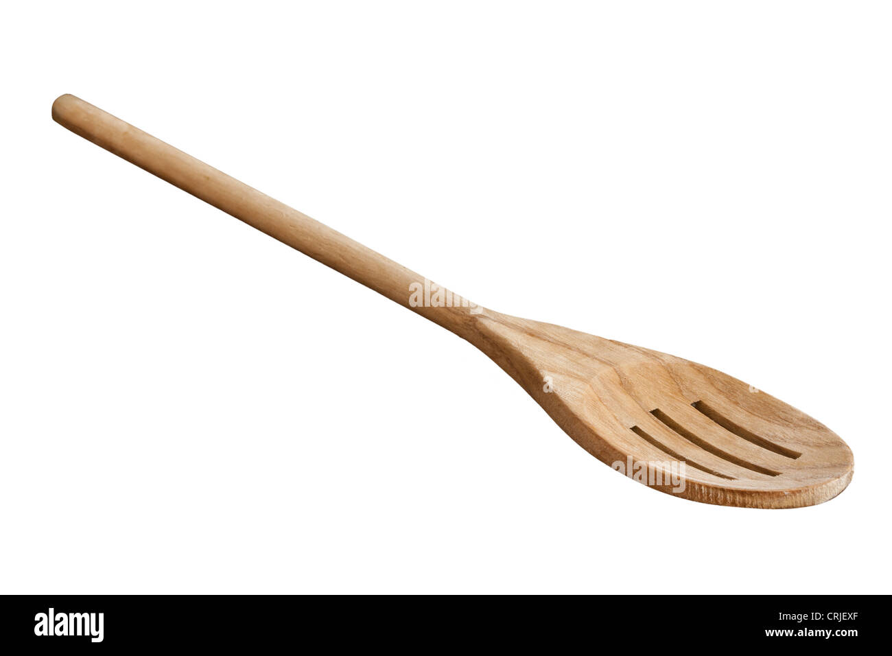 Slotted wooden kitchen spoon on white Stock Photo Alamy