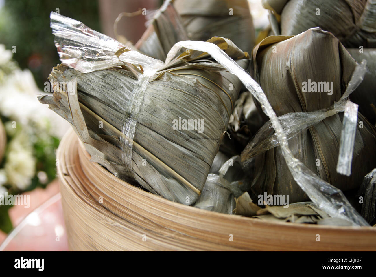 Chinese rice dumplings wrapped in reed leaves Stock Photo - Alamy