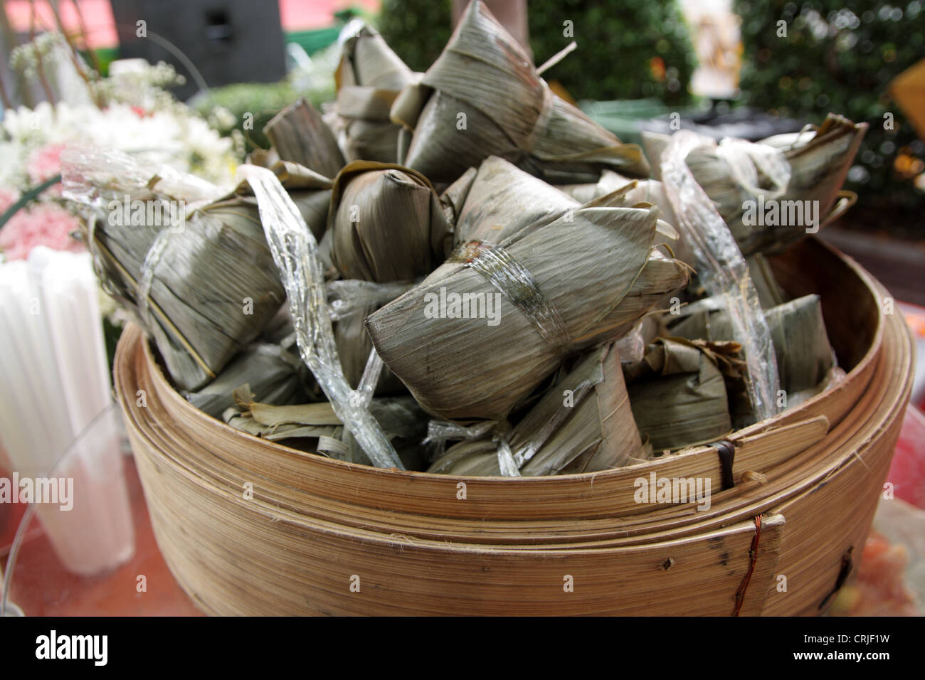 Chinese rice dumplings wrapped in reed leaves Stock Photo - Alamy