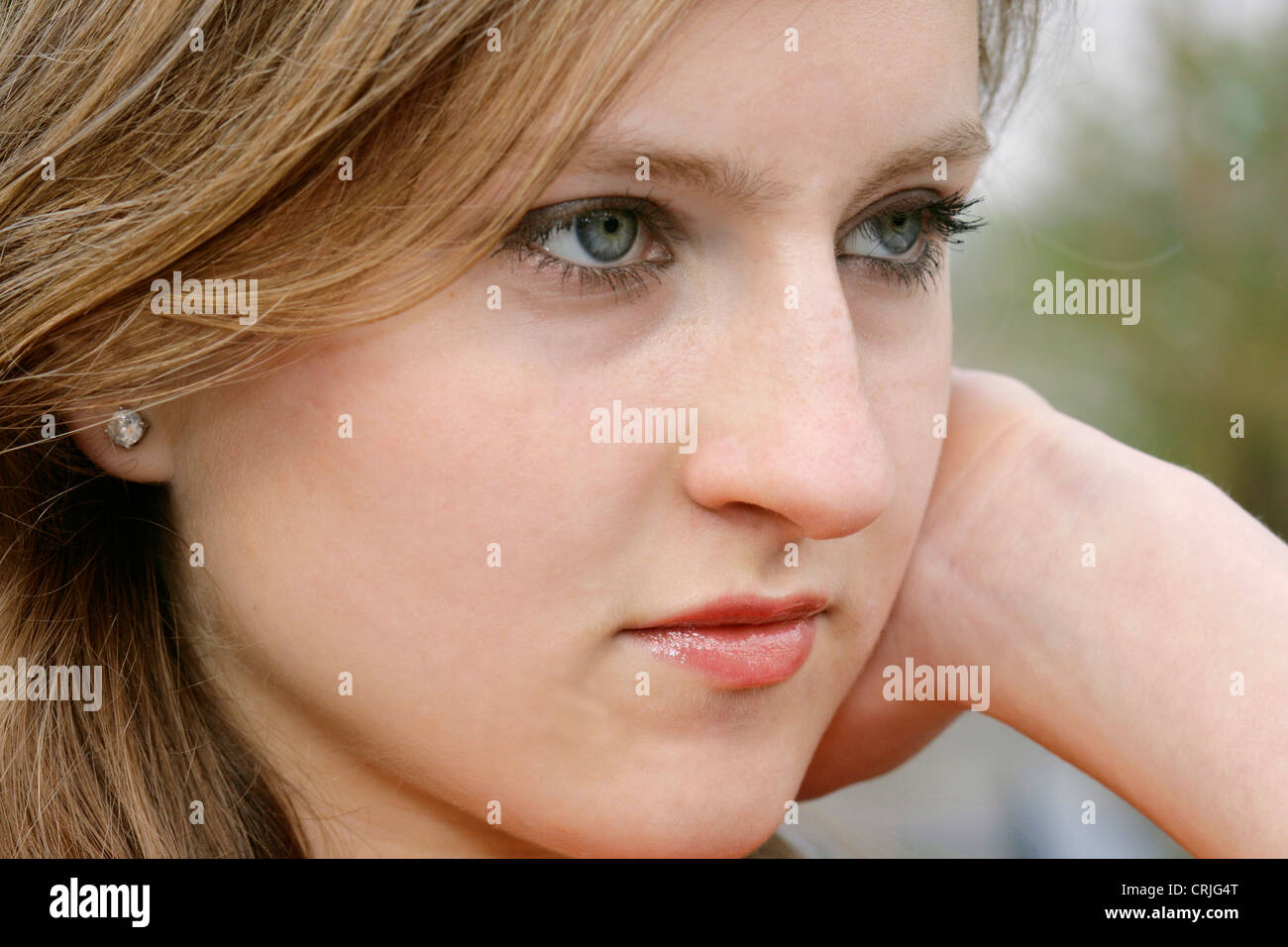 portrait of a thoughtful young woman Stock Photo