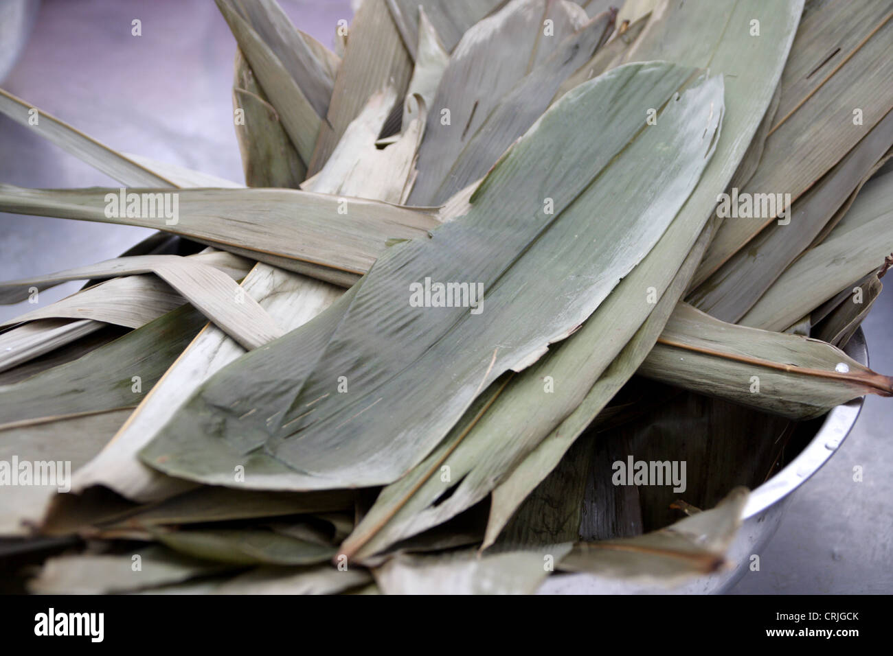 Reed leaves prepare for warp Chinese rice dumplings Stock Photo
