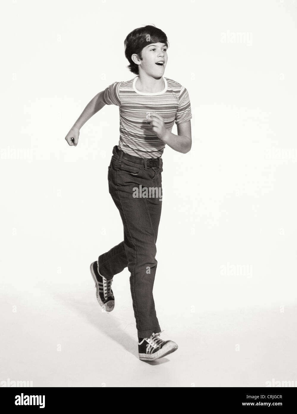 Boy running vintage hi-res stock photography and images - Alamy