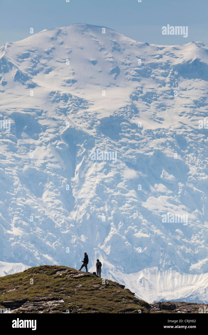 USA, Alaska, Denali National Park, Kantishna Hills. Male hiker climbing. Stock Photo