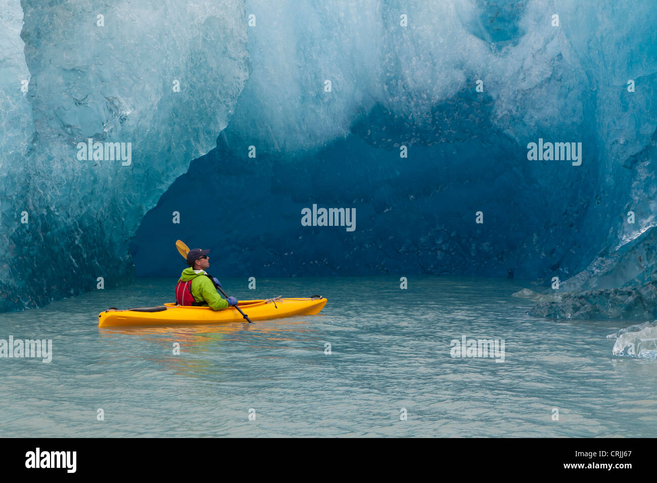 Port Nellie Juan, Prince William Sound, Alaska, a kayaker pauses to