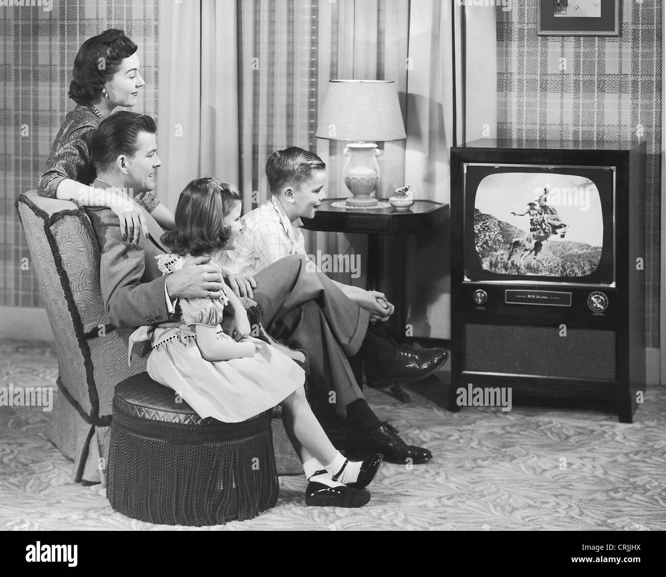 Family watching television Stock Photo