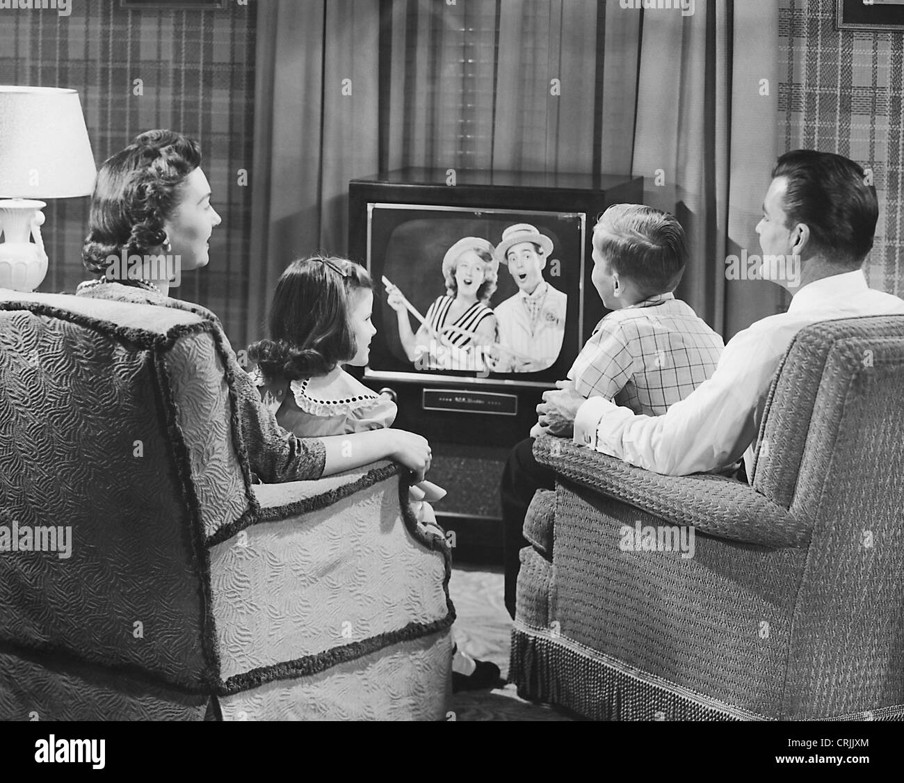 Family watching television Stock Photo
