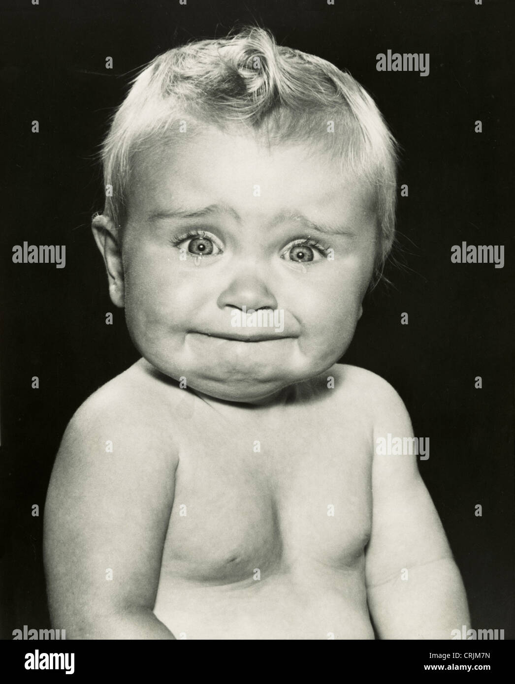 Portrait of baby crying Stock Photo