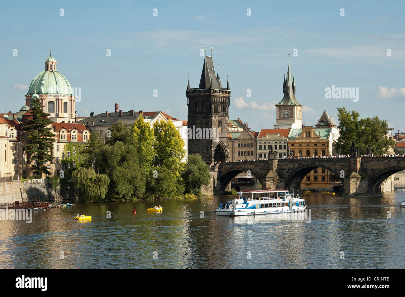 Elk188-1627 Czech Republic, Prague, Old Town Square (Stare Mesto), East end of Charles Bridge with riverboat Stock Photo