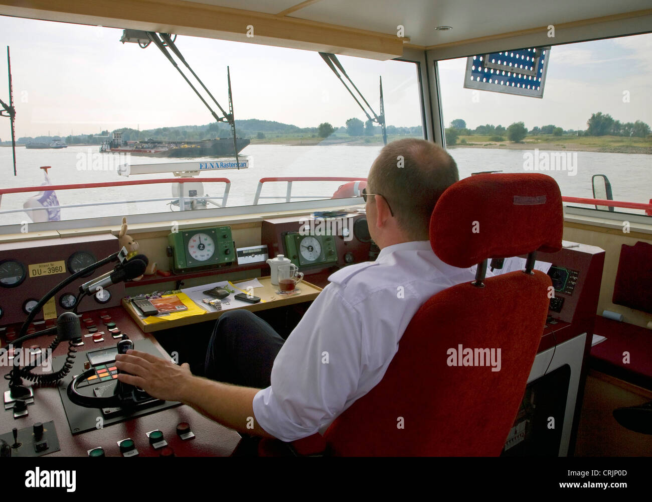 captain of a passenger ship on Rhine River, Germany, North Rhine-Westphalia, Ruhr Area, Duisburg Stock Photo