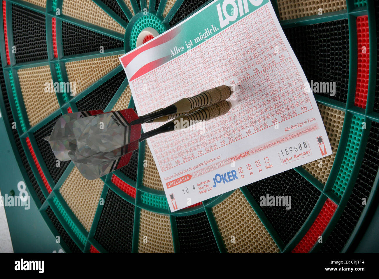 chosing the personal lottery numbers by throwing dart arrows at the