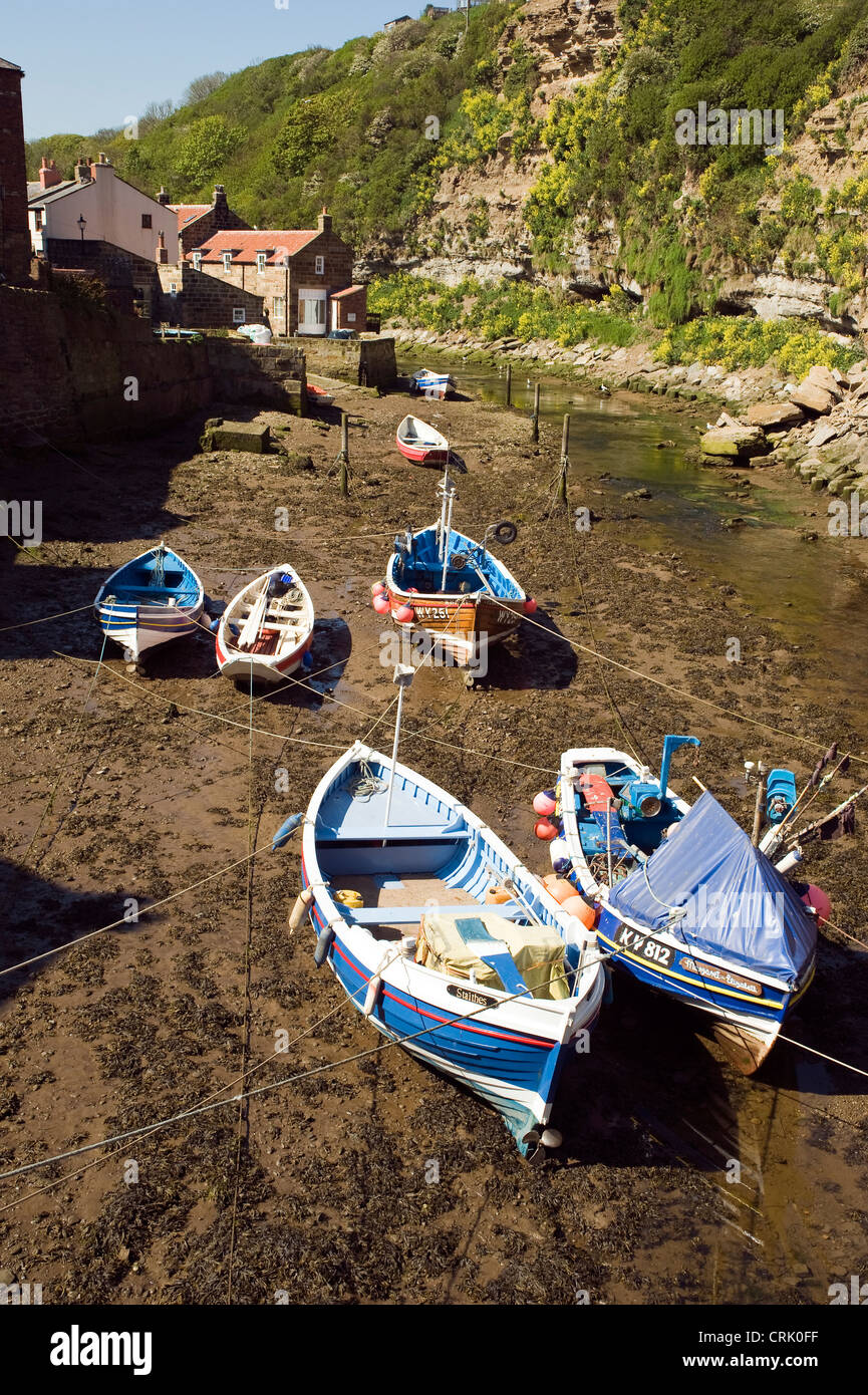 Fishing boats in the beck at Staithes, UK Stock Photo