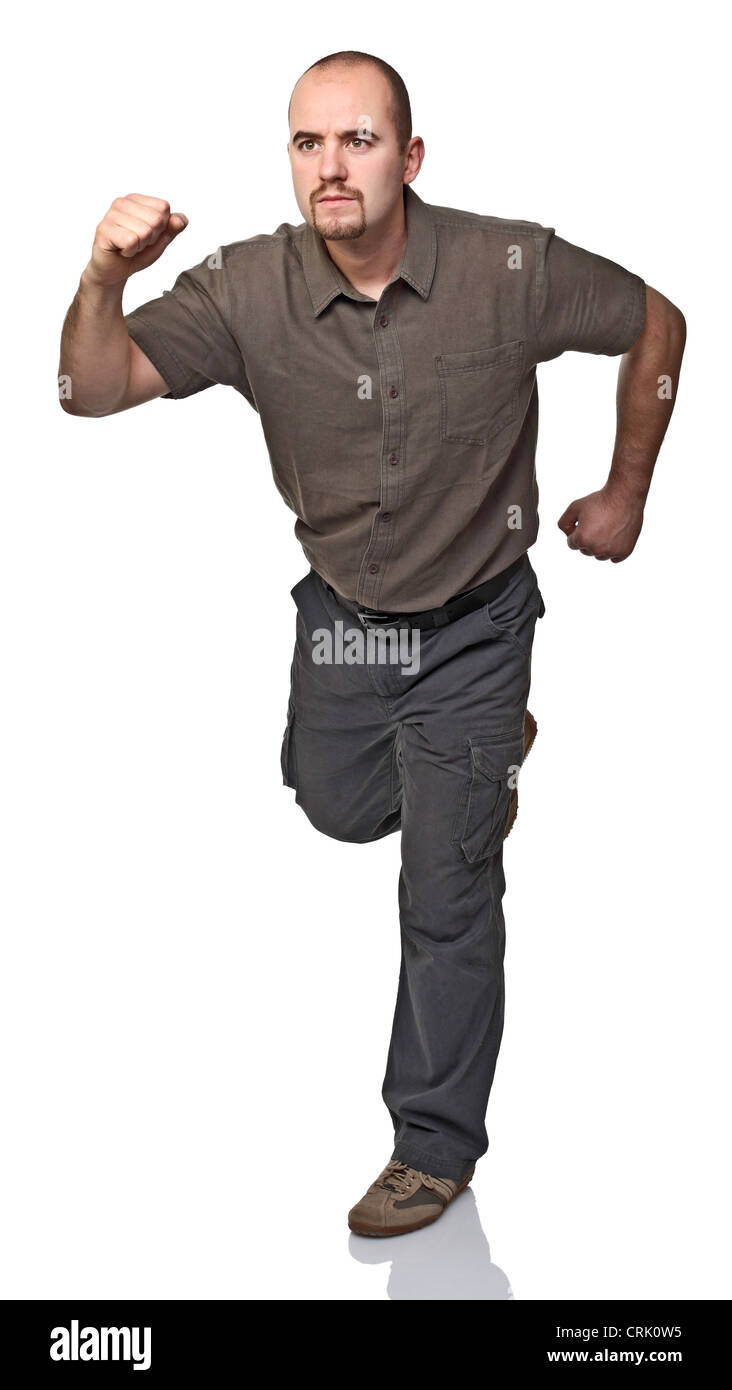 Young happy man make a running pose Stock Photo - Alamy