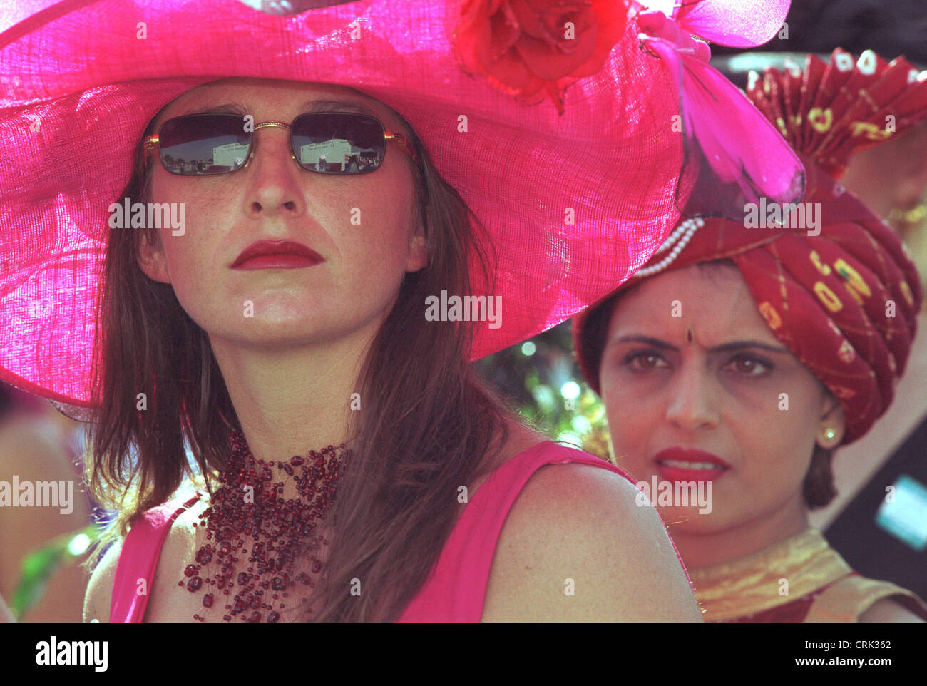 Women with fancy hats in Dubai Stock Photo Alamy