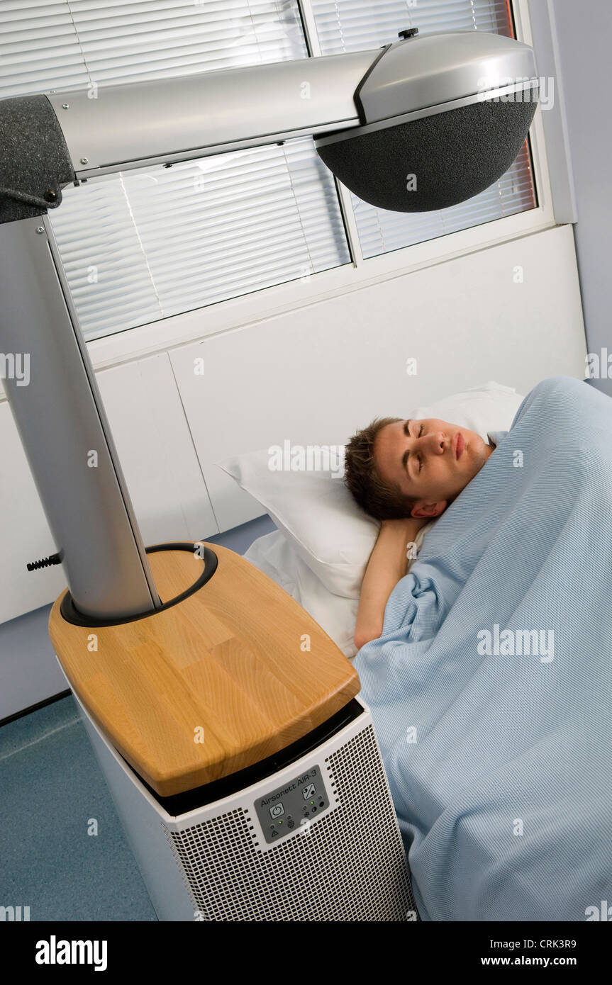 Man sleeping in hospital bed Stock Photo - Alamy