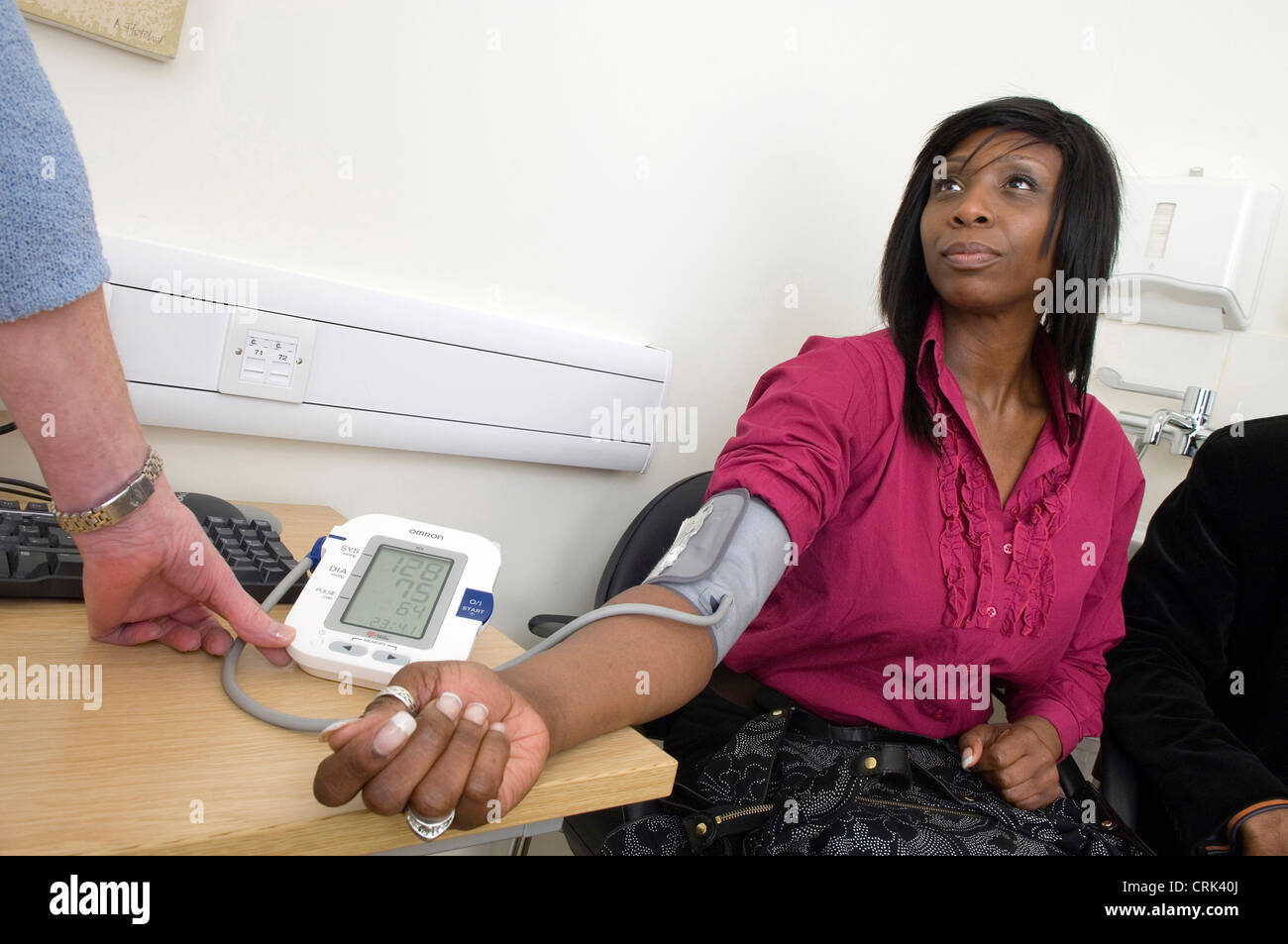 Blood pressure and other basic health checks are carried out before any treatment involved in IVF can begin. Stock Photo