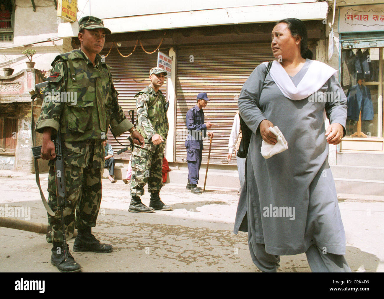 Army and civilian population in Nepal Stock Photo