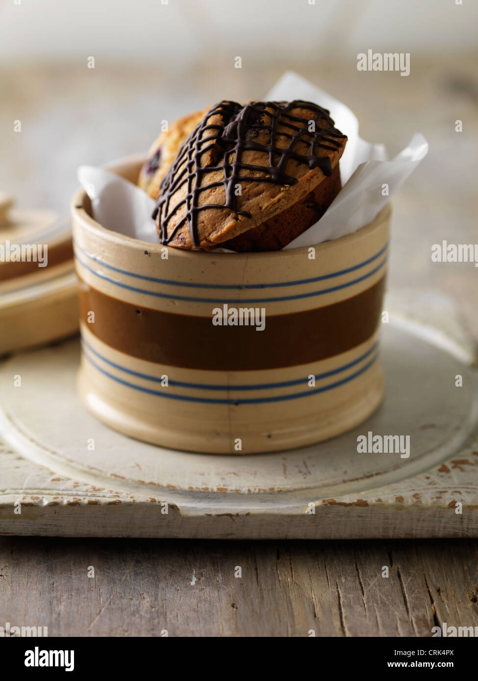 Various muffins in jar Stock Photo