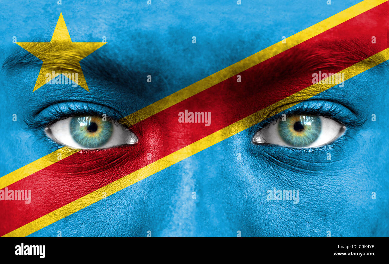 Human face painted with flag of Democratic Republic of Congo Stock Photo
