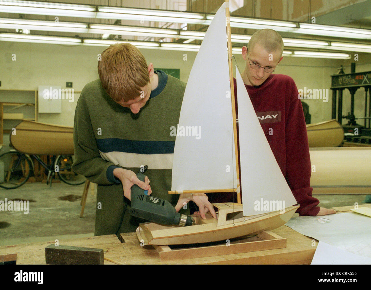 Berlin, an apprentice boat builder builds a model sailboat Stock Photo