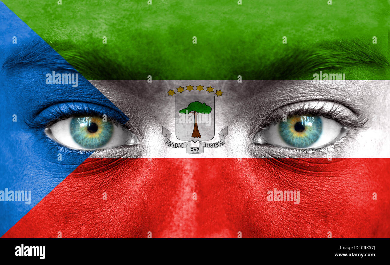 Human face painted with flag of Equatorial Guinea Stock Photo