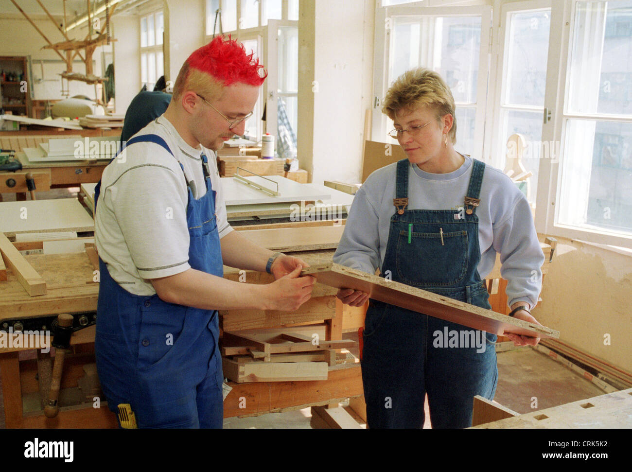 Berlin A Carpenter Apprentice Is Trained By His Mistress Stock Photo Alamy
