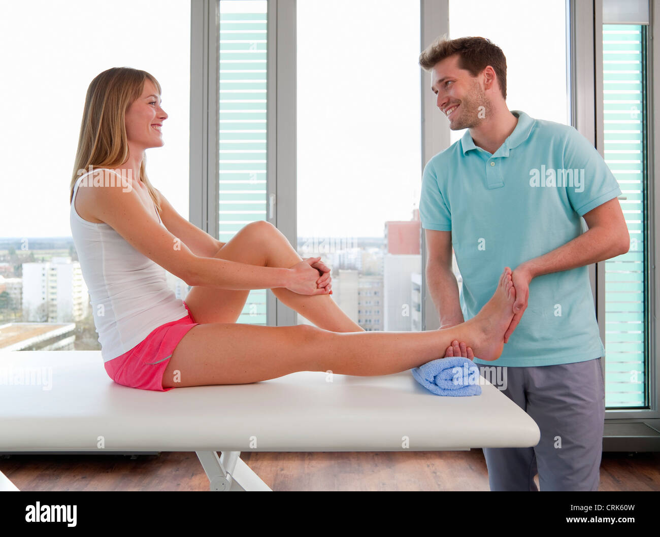 Doctor examining foot hi-res stock photography and images - Alamy