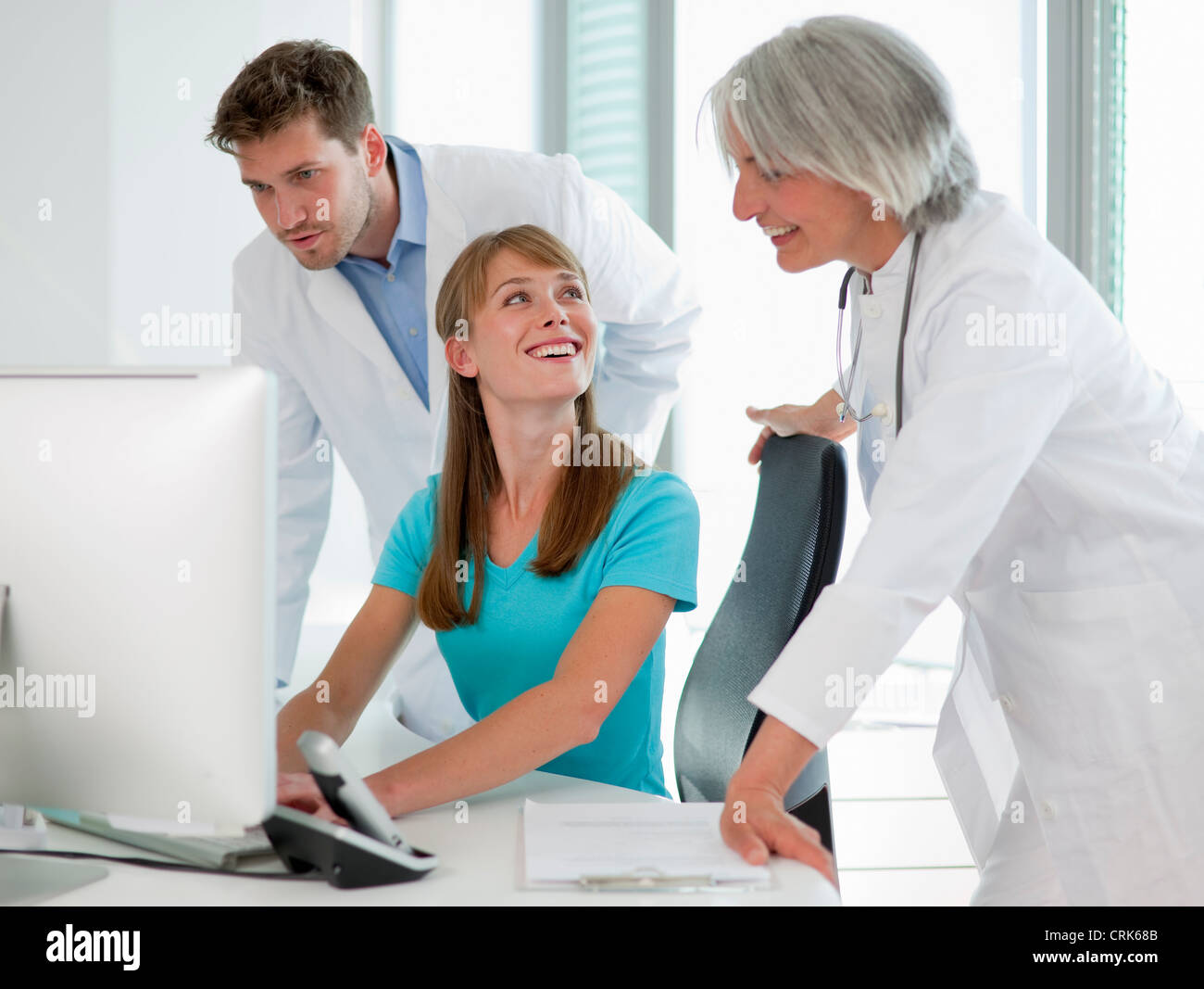 Medical Receptionist Computer High Resolution Stock ...