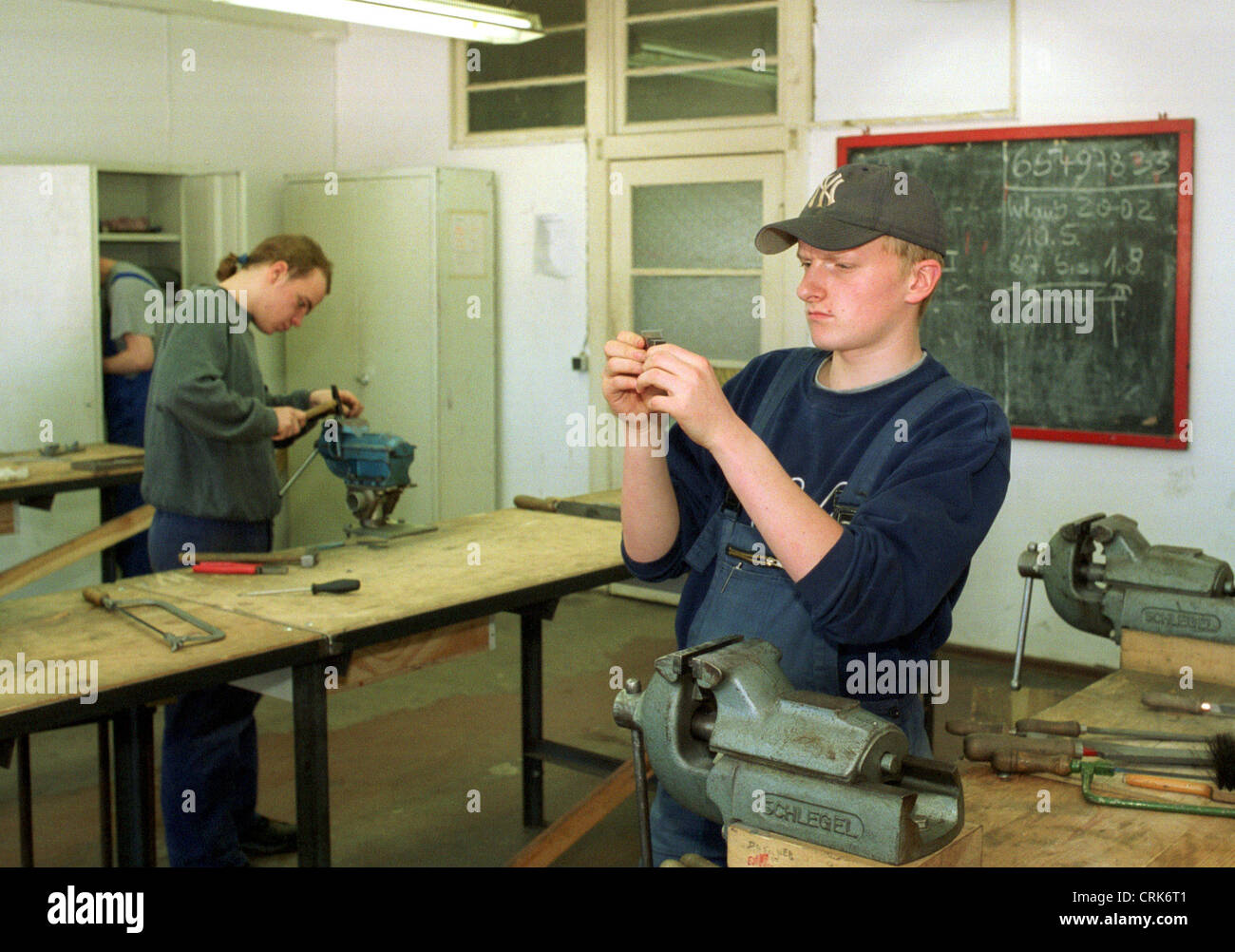 Berlin, an apprentice metalworker measuring out a workpiece Stock Photo